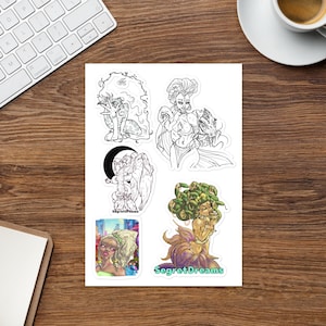 Puede incluir: Una hoja de pegatinas con ilustraciones de fantasía. Las pegatinas representan criaturas míticas, incluyendo a Medusa, y otras figuras femeninas. Las pegatinas son en blanco y negro y a color, con el texto "SegretDreams".