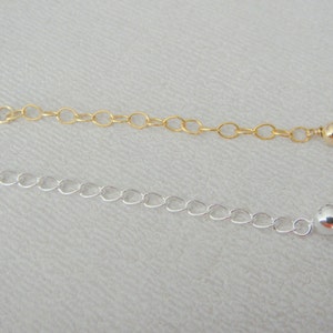 Extensor preenchido com ouro ou prata esterlina de 14 Kt com bola