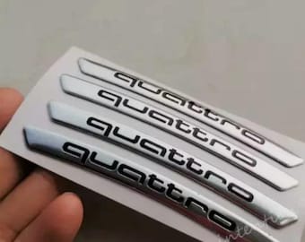 4 pegatinas de metal para llantas Quattro de 9 cm en color plateado para Audi