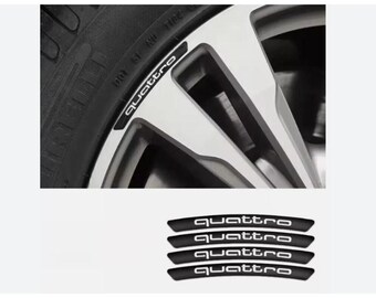 4 pegatinas de metal para llantas Quattro de 9 cm en color negro para Audi