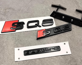 Set di 3 emblemi SQ8 nero lucido: stemma posteriore SQ8, emblema griglia anteriore e logo Quattro per Audi SQ8 - Kit emblema auto nero