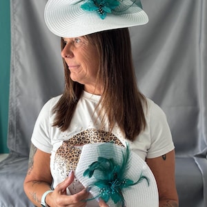 Stunning white and green Fascinator with matching clutch bag