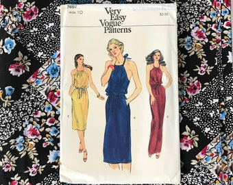 Vintage Dress 80s Era Floral Day Dress Size 4 Petite: A cute button front gathered skirt t shirt knit dress with pockets and a 28 waist