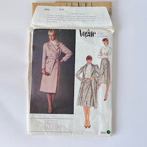 May include: Vogue Paris Original sewing pattern number 2605 for a coat and skirt designed by Pierre Balmain. The pattern features three women wearing the designs. The text "Vogue Paris Original" is printed in white on a red background.