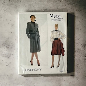 May include: Vintage Vogue Patterns sewing pattern for a skirt and jacket set by Givenchy. The pattern is Paris Original and the pattern number is 1203.