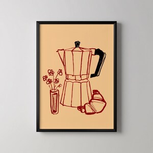 May include: A framed art print featuring a coffee-themed illustration. The artwork depicts a red coffee maker, a croissant, and a vase of flowers, all outlined in red against a beige background. The frame is black.