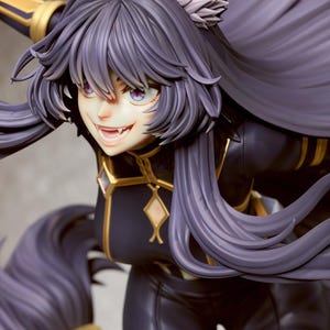 May include: A detailed figurine of a character with long, flowing purple hair and wolf-like ears. The figure wears a black outfit with gold accents and has a fierce expression with visible fangs. The figure's pose suggests dynamic movement.
