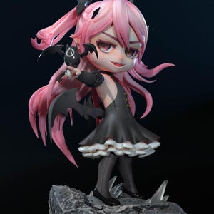 May include: A chibi-style figurine of a character with pink hair and a black dress, holding a small bat. The figure stands on a gray, rocky base. The dress has a white ruffled trim. The character has a determined expression.