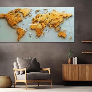 May include: A large, rectangular wall clock featuring a detailed map of the world. The continents are rendered in a warm, golden hue, with a clock face in the center. Roman numerals mark the hours. The clock is mounted on a light blue background.