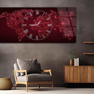 May include: A rectangular wall clock with a red world map design, showing interconnected lines and dots. The clock face has Roman numerals. The clock is mounted on a dark red background, suitable for a living room.