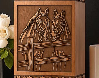 May include: Wooden box with a carved relief of two horses behind a fence. The box is a warm brown color, with floral carvings around the top and bottom. The horses are detailed, with bridles visible. A decorative item.