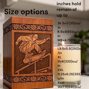 Custom engraved wooden urn box for cremation ashes with skateboard design, decorative carved borders, smooth brown finish, placed beside candle and flower vase for peaceful memorial setting.