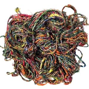May include: A tangled ball of colorful yarn, featuring a mix of vibrant hues including red, green, orange, and yellow. The yarn appears to be made of multiple strands, creating a textured and layered effect. Ideal for crafting projects.