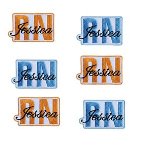 May include: Embroidered patches featuring the name "Jessica" and the letters "RN" in a rectangular design. The patches are in various colour combinations, including orange and white, and blue and white. The text is in a cursive font.