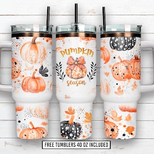 May include: Three white 1.18 litre tumblers with black straws. Each tumbler features a pumpkin design with orange and black pumpkins, fall leaves, and the text "Pumpkin Season". The tumblers have a copper-coloured rim.