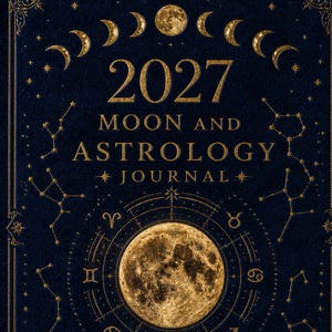 May include: A dark blue journal cover featuring gold foil text that reads 2027 MOON AND ASTROLOGY JOURNAL. The design includes a central moon illustration, a circular zodiac wheel, various star constellations, and a lunar phase cycle at the top.