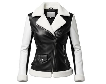 May include: A black and white faux leather jacket with a white faux fur collar and cuffs. The jacket has a zipper closure, a small pocket, and a fitted silhouette. The sleeves are white, and the body is black.