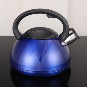 May include: A shiny blue tea kettle with a black handle and lid. The kettle has a stainless steel spout and a rounded body. The handle is arched and the lid has a small handle for easy removal. The kettle is designed for stovetop use.