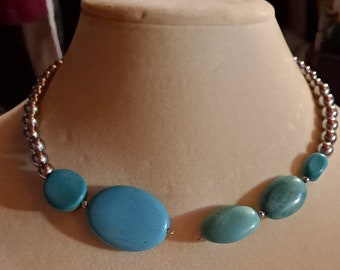 Memory wire choker with large turquoise and smaller silver glass beads. Open front, similar to Torque style. Boho, ethnic.