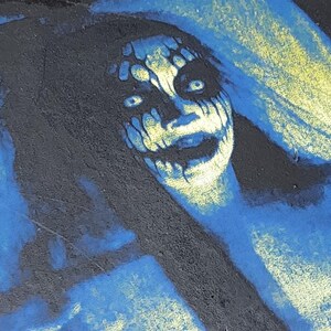 Laser etched female veiled spectre in the window ghost spooky AI art 3x5 horror