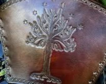 A pair of Tree of Gondor inspired leather bracers