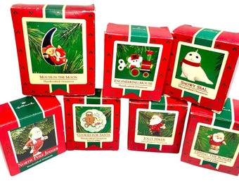 Lot of 7  Hallmark Keepsake Ornaments Vintage 80s Assorted Santa Seal Train