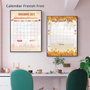 May include: Two framed wall calendars for November 2025. The calendars feature a beige background with orange and yellow autumn leaves. The text "NOVEMBRE 2025" is at the top of each calendar. One calendar has the text "NOTES" at the bottom.