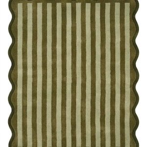 May include: A rectangular area rug featuring a repeating pattern of vertical olive green and light beige stripes. The rug is finished with a dark olive green scalloped edge that follows the wavy contour of the entire perimeter of the piece.