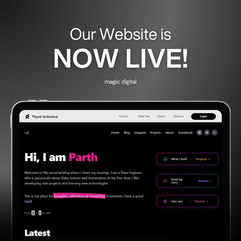 May include: A digital tablet displays a website with the text "Our Website is NOW LIVE!" and "magic digital." The website's homepage features the text "Hi, I am Parth" and navigation links. The tablet has a black border.