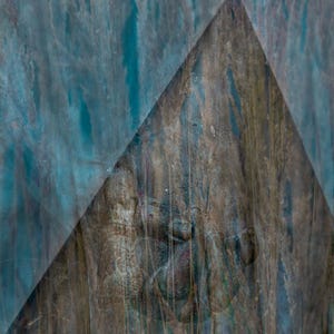 May include: Abstract artwork with a textured, layered design. A triangular shape overlays the image, which is a mix of blue, brown, and grey hues. The background hints at a natural, possibly plant-based, theme.