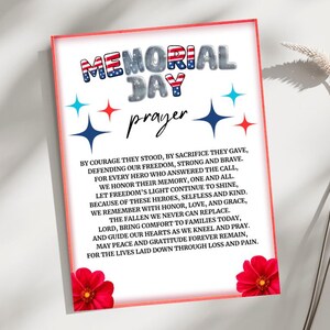 May include: A framed print with the words "MEMORIAL DAY prayer" in patriotic colors. The print includes a poem honoring fallen heroes, with red and blue star accents and red flowers at the bottom.