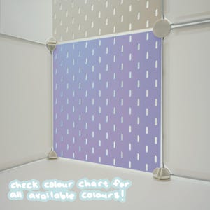 May include: A modular storage cube panel featuring a light purple surface with a repeating pattern of vertical white dashes. The panel is secured by light gray plastic corner connectors and is positioned next to a beige panel with similar slots.
