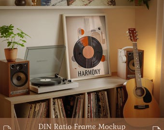 May include: A framed art print with a vinyl record design and the word "HARMONY" sits on a wooden shelf. A white turntable, speakers, and a guitar are also present. The image includes the text "DIN Ratio Frame Mockup PSD & JPG".