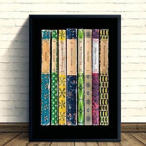 May include: A framed print featuring a collection of vintage book spines. The books display titles like "Black Dog," "Rock and Roll," and "Stairway to Heaven." The spines showcase a variety of colors and patterns, including floral and geometric designs. The frame is black.