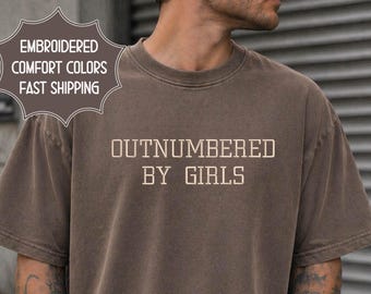 Embroidered Comfort Colors® Outnumbered by Girls Tee, Christmas Gift for Girl Dad, Embroidery Minimal Text Dad Shirt