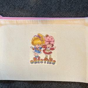 Rainbow Brite and Strawberry Shortcake Besties pouch.  Perfect size for a pencil pouch or makeup pouch.