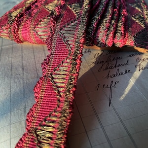 Beautiful Antique Raspberry woven trim with metallic gold accent , half yard with more available