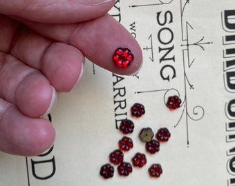 Charming very small ANTIQUE glass ruby red flower buttons or beads, lot of 12
