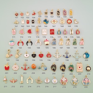 May include: A collection of small gold-tone metal charms with colorful enamel details, arranged in rows and numbered from 151 to 220. The charms feature various shapes including hearts, animals, food items, anchors, flowers, and geometric symbols.