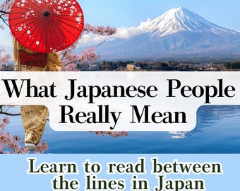Puede incluir: Portada de libro con el monte Fuji y un paraguas rojo. El título es "What Japanese People Really Mean", con el subtítulo "Learn to read between the lines in Japan". Incluye "72 Best Phrases".