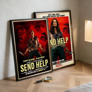 May include: Two framed movie posters with black frames and a magnifying glass. The posters are for the movie "Send Help" and feature a red background with actors and text. The magnifying glass has a gold frame and a black handle.