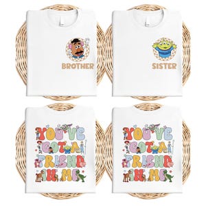 May include: Four white t-shirts with Toy Story character designs. Two shirts have "Brother" and "Sister" text. The other two shirts have the text "You've Got a Friend in Me" with various Toy Story characters.