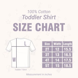May include: A white toddler t-shirt size chart with measurements in inches. The chart includes sizes 2T, 3T, 4T, and 5T, with corresponding width and length measurements. The text "100% Cotton Toddler Shirt" is at the top.