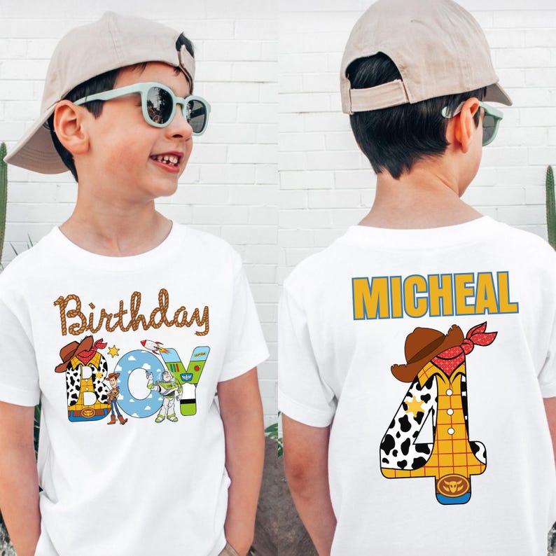 May include: White t-shirt with a colorful "Birthday Boy" design featuring a cowboy hat, a rocket, and the character Buzz Lightyear. The back of the shirt displays the name "Micheal" and a number 4 with a cowboy hat.