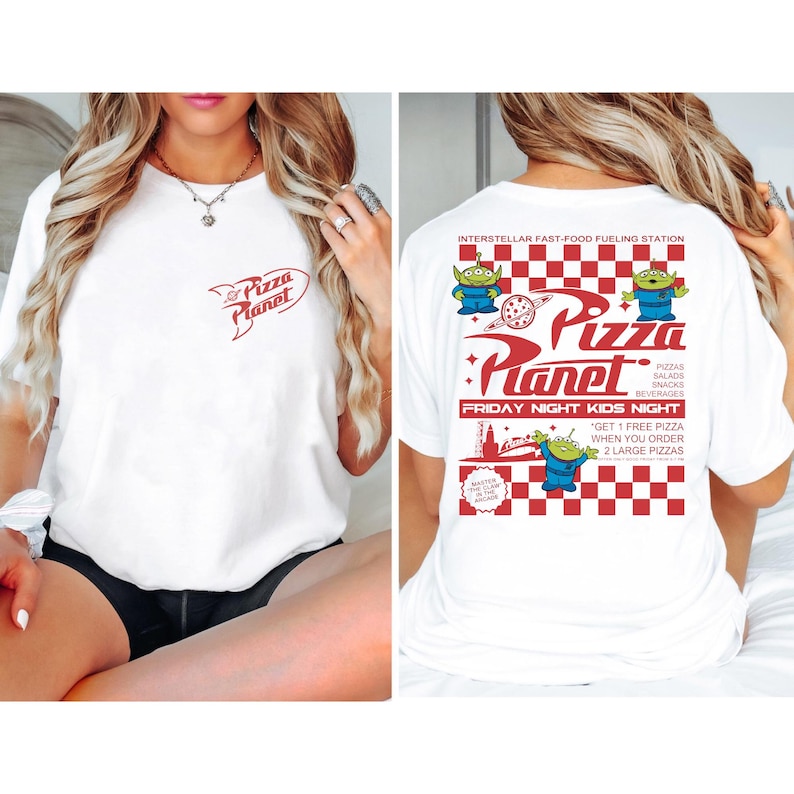 May include: White t-shirt featuring the "Pizza Planet" logo on the front and back. The back design includes the text "Interstellar Fast-Food Fueling Station," alien characters, and the words "Friday Night Kids Night."