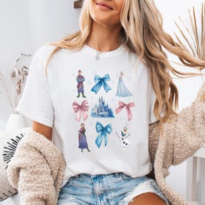 May include: A rustic wooden sign with the text "Welcome" in a handwritten style. The sign is painted white with a distressed finish, and a small, decorative heart is attached to the bottom. The background is a blurred image of a wooden surface.