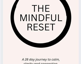 May include: A poster in pale pink with the words "THE MINDFUL RESET" in black, framed by a black brushstroke circle. The text below reads: "A 28 day journey to calm, clarity and connection." The author is Dr Lowri Evans.