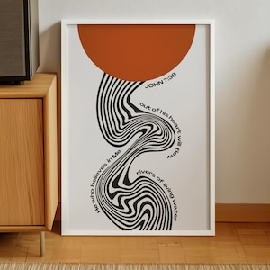May include: A rectangular wall art print featuring a large burnt orange semi-circle at the top and a black and white wavy, liquid-like pattern below. The text reads: JOHN 7:38, He who believes in Me out of his heart will flow rivers of living water.