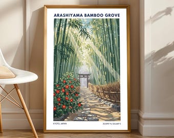 May include: Framed art print of Arashiyama Bamboo Grove in Kyoto, Japan. The artwork features a pathway through a bamboo forest with sunlight streaming through the trees. Red flowers and a wooden fence line the path. The print is in a gold frame.