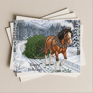 May include: A holiday greeting card featuring a brown horse pulling a Christmas tree through a snowy forest. The horse is adorned with bells and harnesses. The card reads "Happy Holidays" in white text.
